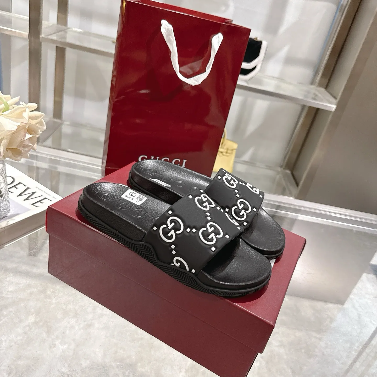 🅿️300💰 🌹Gucci official website Good Game slippers and sandals for men and women. In this special edition series, the acronym of the brand founder Guccio Gucci gives new meaning. In the gaming world, "GG" is a symbol of good sportsmanship and stands for "Good Game," which conveys the value system of the community. The modern acronym is a playful ode to the brand’s origins in the world of sports and leisure, illustrating how Gucci’s heritage continues to evolve. The parting greeting expresses the Gucci Good Game motto as the brand moves into new worlds, creating centers of play, self-expression, talent, freedom and individuality. Made with a rubber upper, these slippers are embellished with the collection's signature logo.  Rubber upper, unisex, G logo embossed, molded footbed, rubber sole, flat, made in Italy, sizes 36 to 46